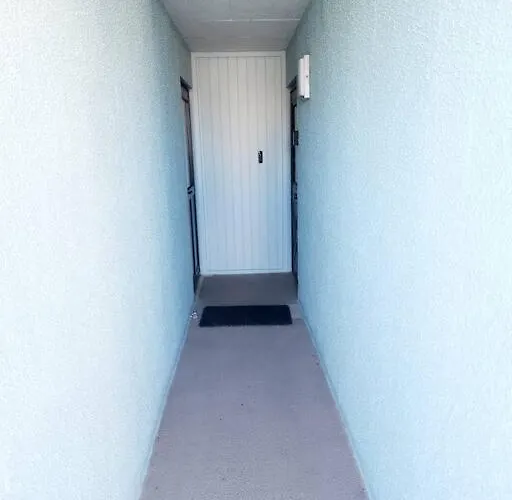 Apartamento Beachfront Oasis Steps To The